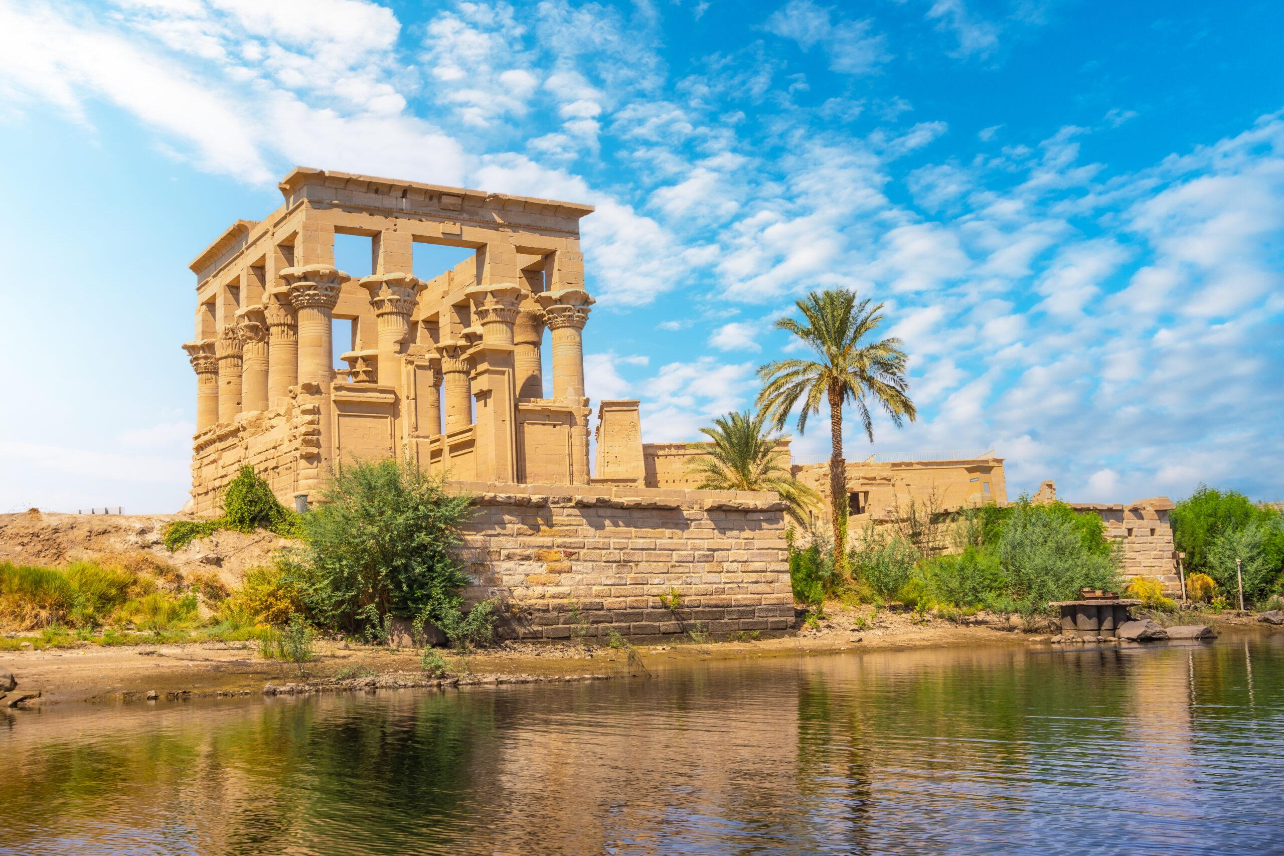 The Beautiful Temple Of Philae And The Greco-Roman Buildings Seen From The Nile River, A Temple Dedicated To Isis, Goddess Of Love. Aswan. Egyptian